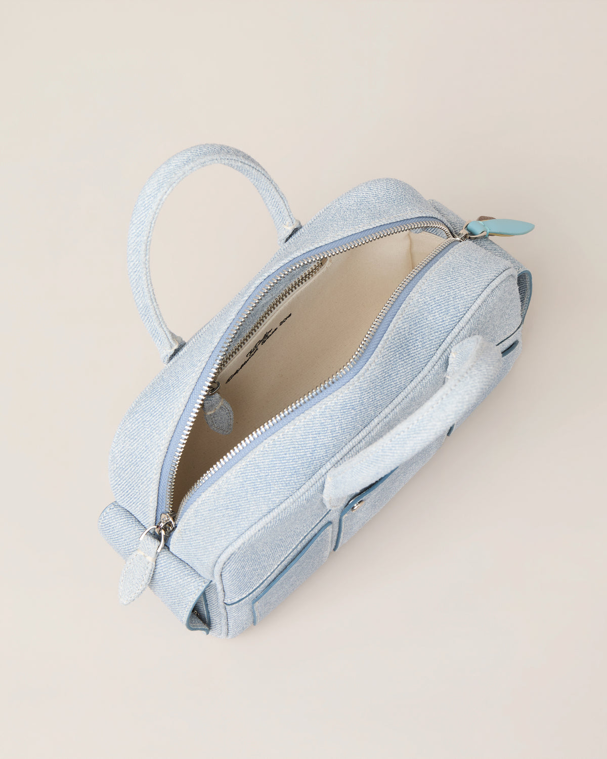 SMALL ARC POCKET BAG